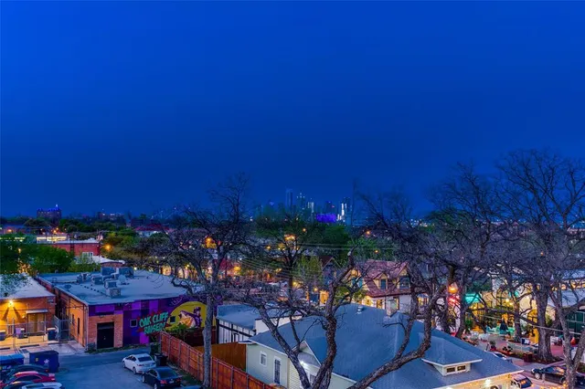 a view of yard with outdoor seating and green space