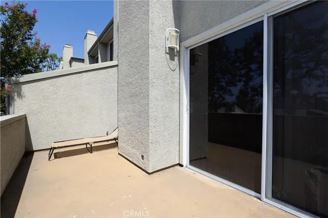 a view of a room with rack on the wall