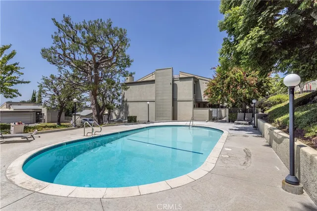 a view of outdoor space yard and swimming pool