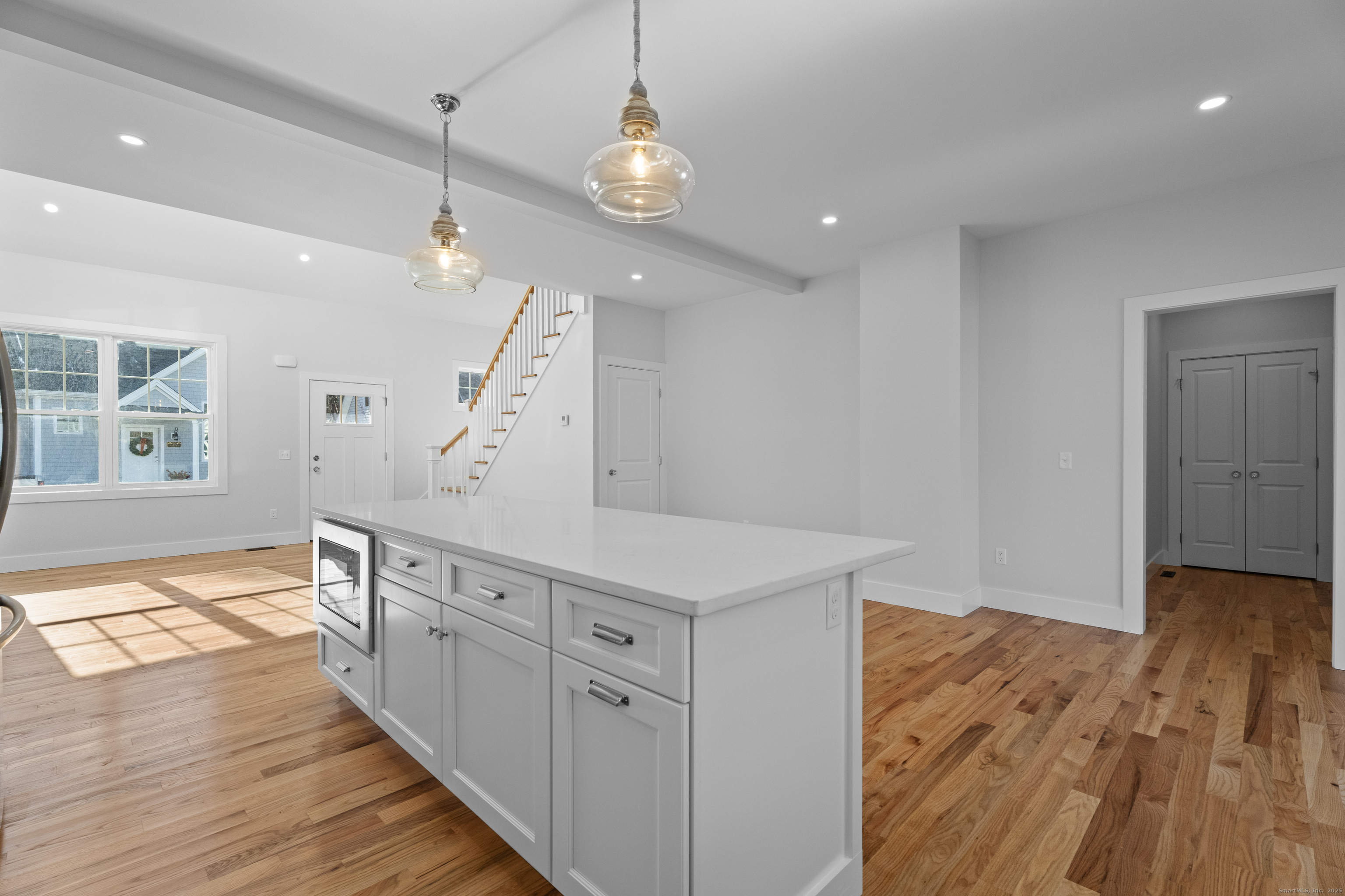 34 Ivy Hill Road, Unit 34 Waterford, CT 06385 - Photo 11 of 33 a view of a kitchen center island wooden floor and center island