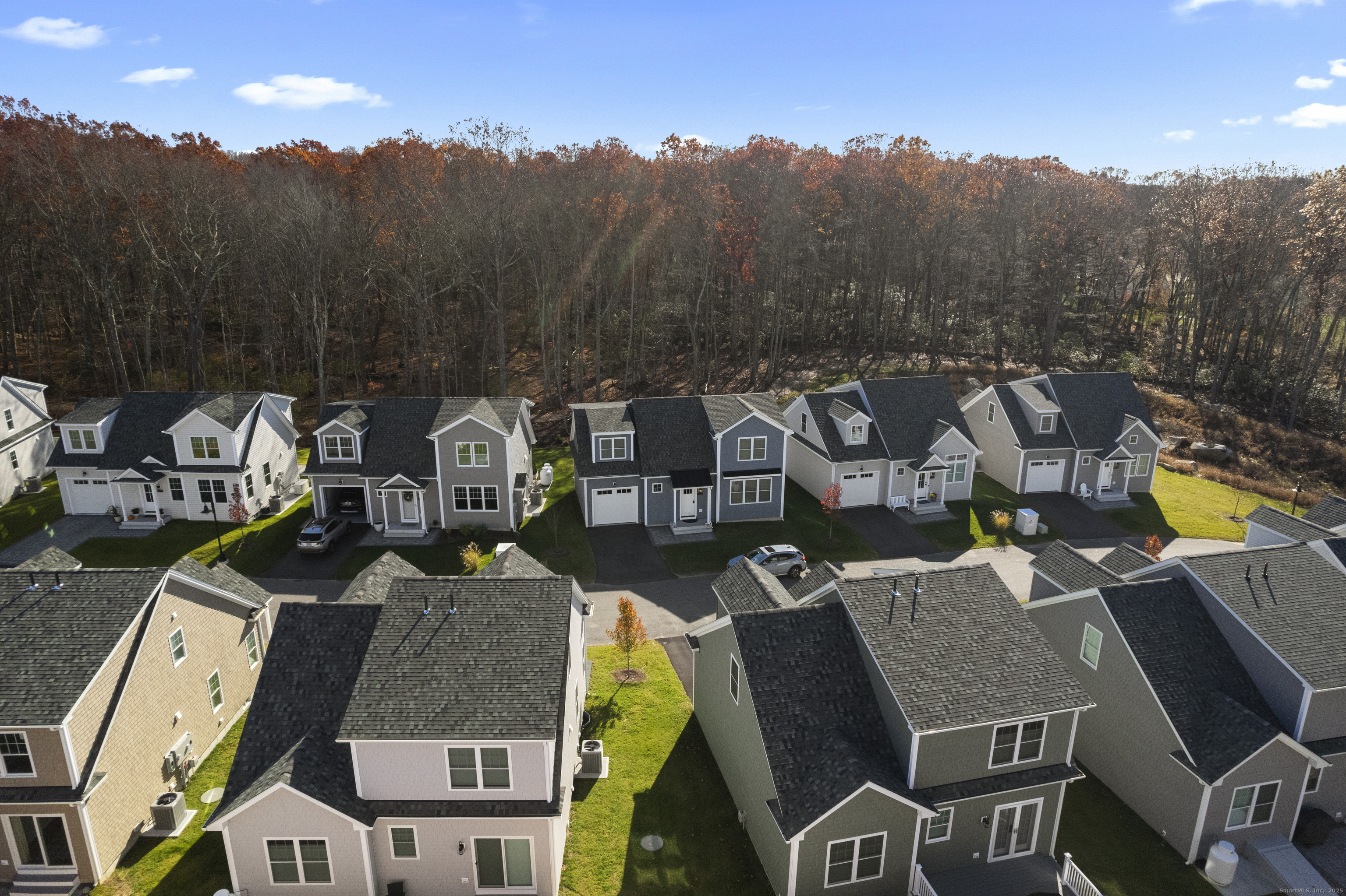34 Ivy Hill Road, Unit 34 Waterford, CT 06385 - Photo 13 of 36 an aerial view of a house with swimming pool and big trees
