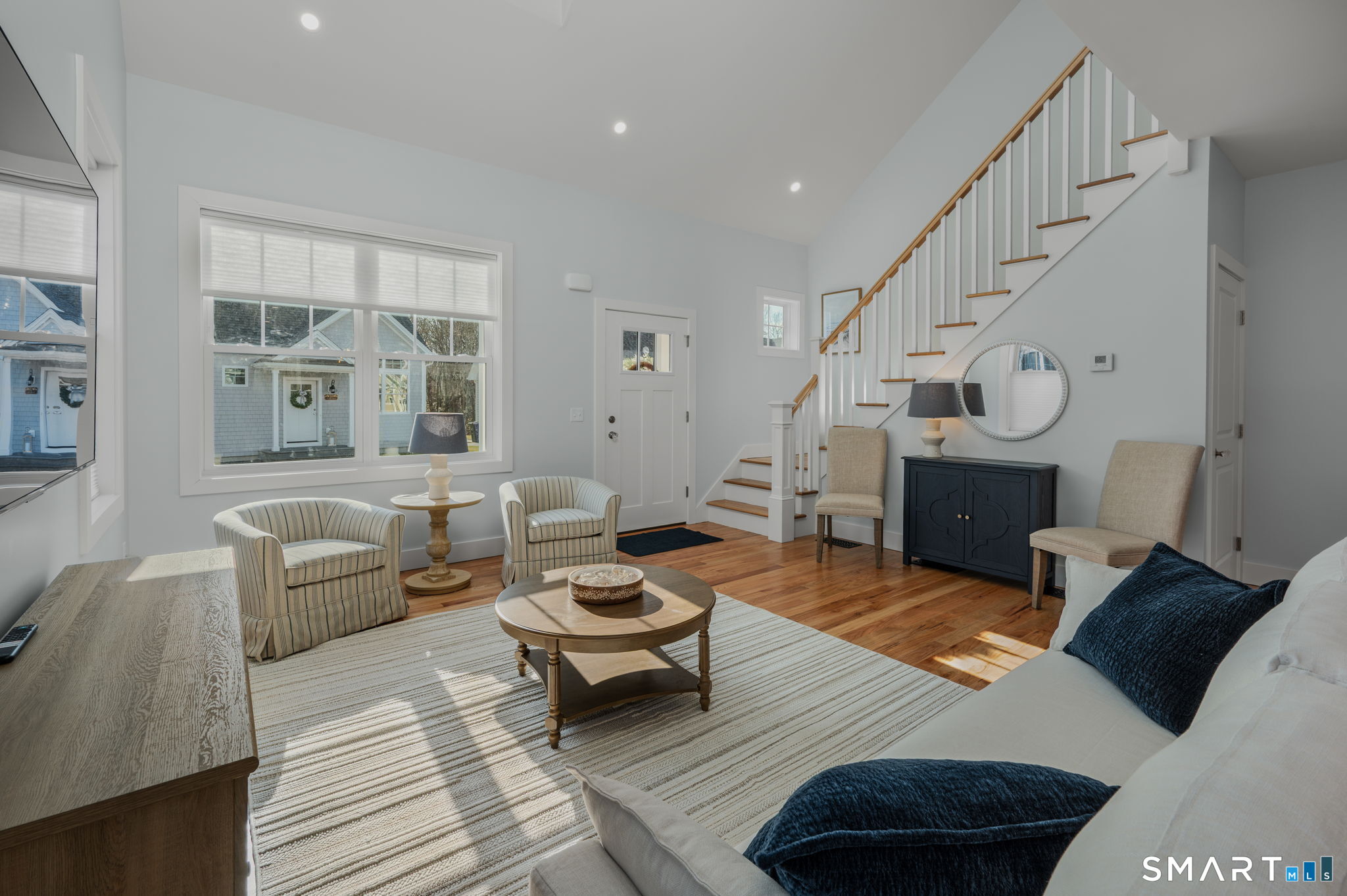 34 Ivy Hill Road, Unit 34 Waterford, CT 06385 - Photo 29 of 36 a living room with furniture and a fireplace