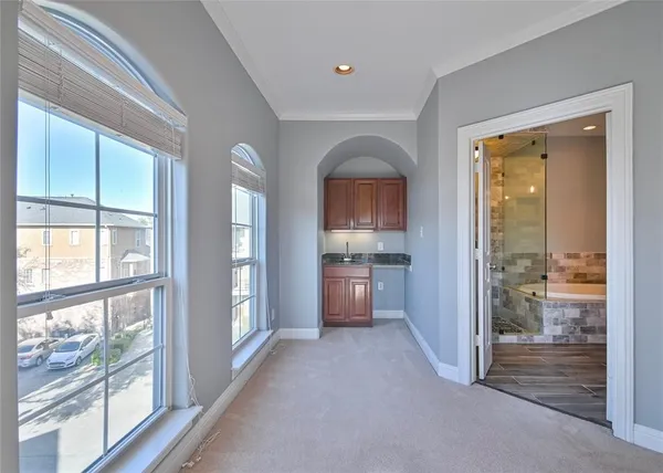 a view of a hallway with a living room