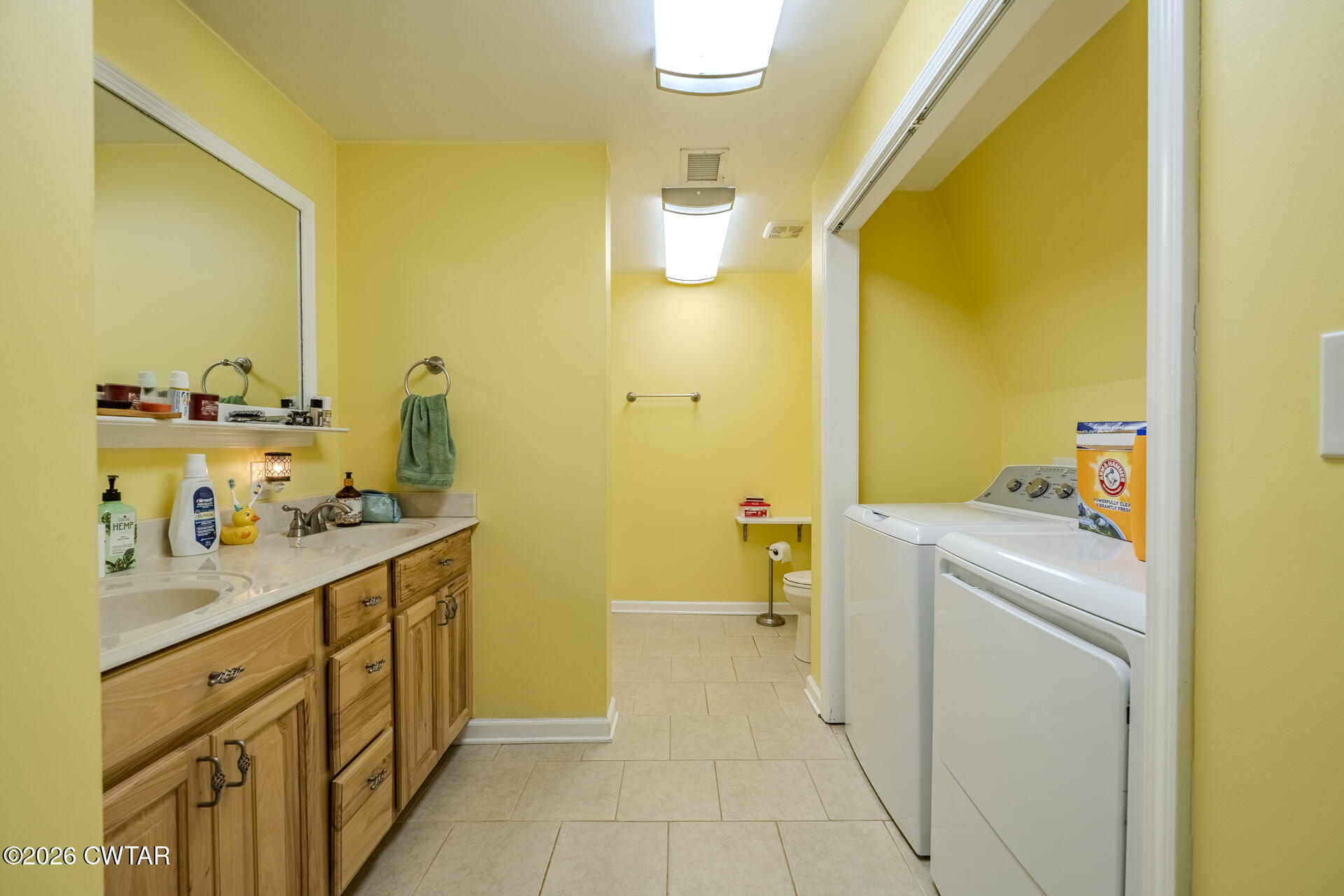 61 Con Pennington Road Kenton, TN 38233 - Photo 24 of 46 a bathroom with a sink mirror and a bath tub