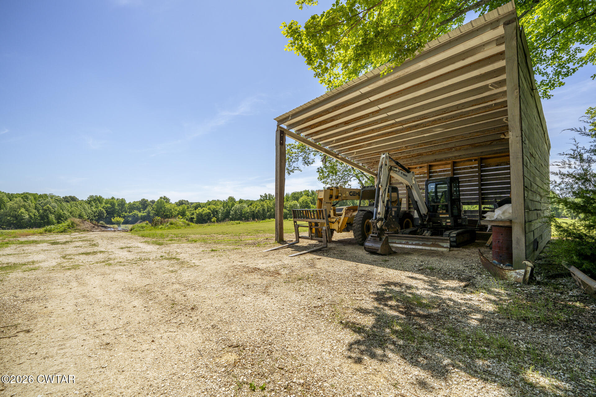 61 Con Pennington Road Kenton, TN 38233 - Photo 38 of 46 a view of a lake with a sitting space
