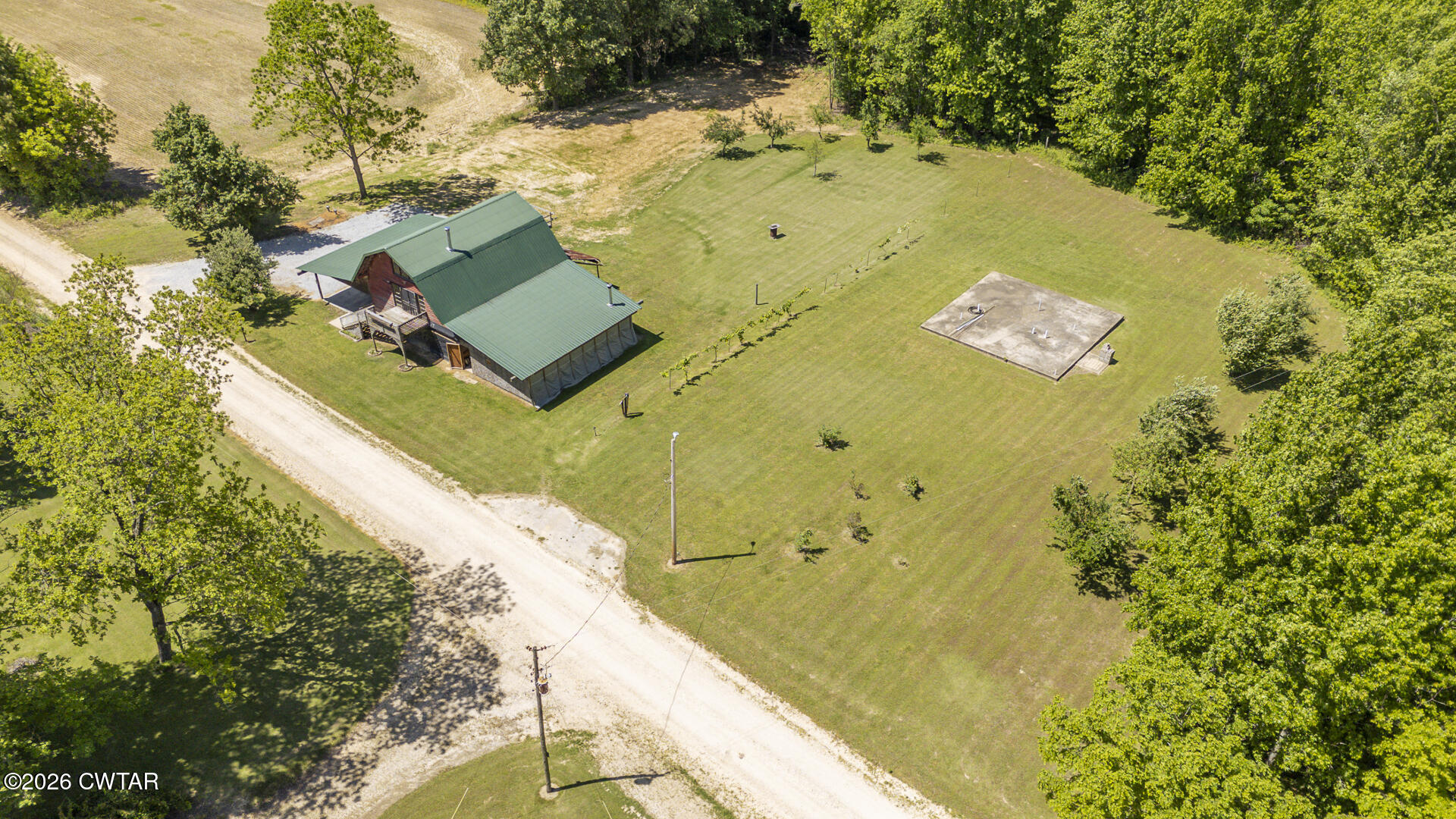 61 Con Pennington Road Kenton, TN 38233 - Photo 8 of 46 a view of a swimming pool with a yard