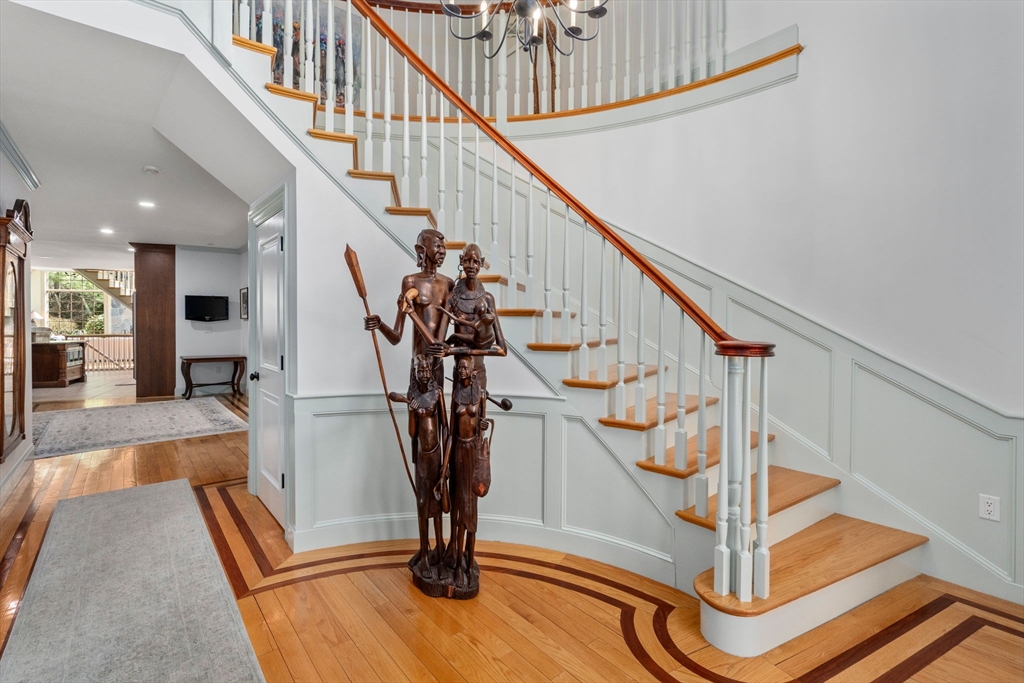 80 Loring Road Weston, MA 02493 - Photo 2 of 28 a view of entryway livingroom and hall with wooden floor