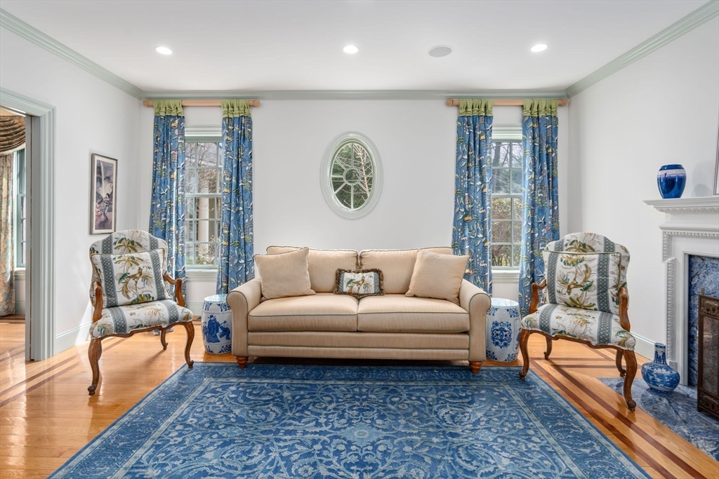 80 Loring Road Weston, MA 02493 - Photo 5 of 28 a living room with furniture and a table