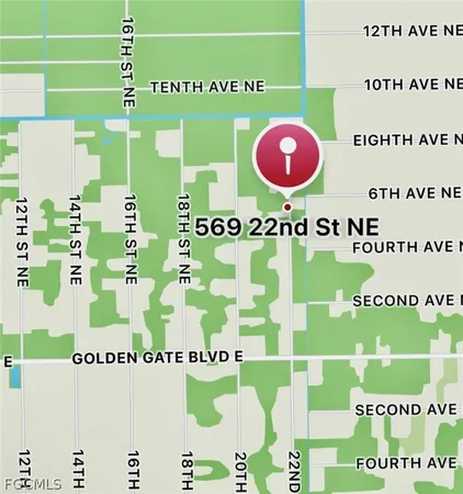 an aerial view of a residential houses with outdoor space