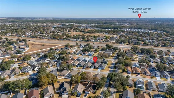 a view of a park with palm trees