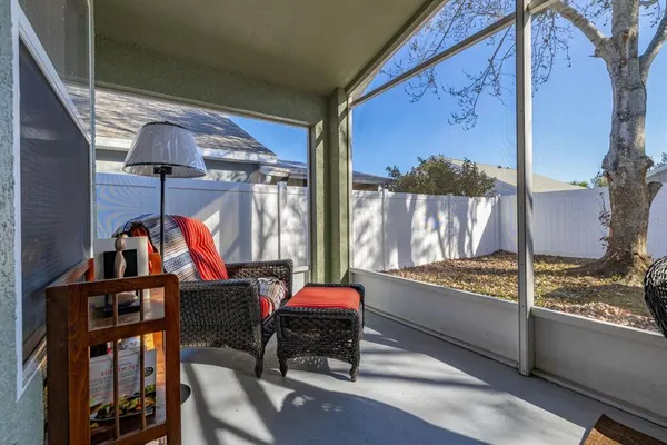 a view of a dinning table and chairs in patio