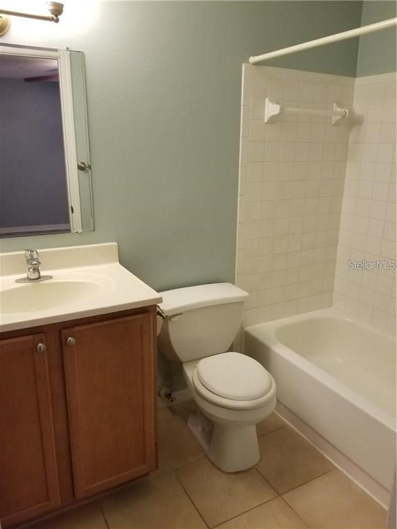 803 Lake Haven Square, Unit 202 Brandon, FL 33511 - Photo 11 of 17 a bathroom with a sink a toilet and a bathtub