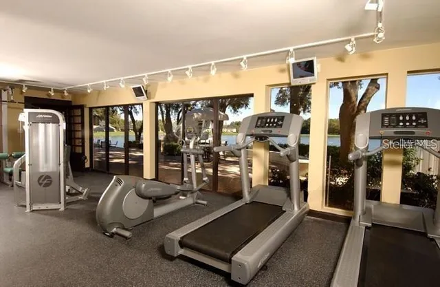 a gym room with gym equipment