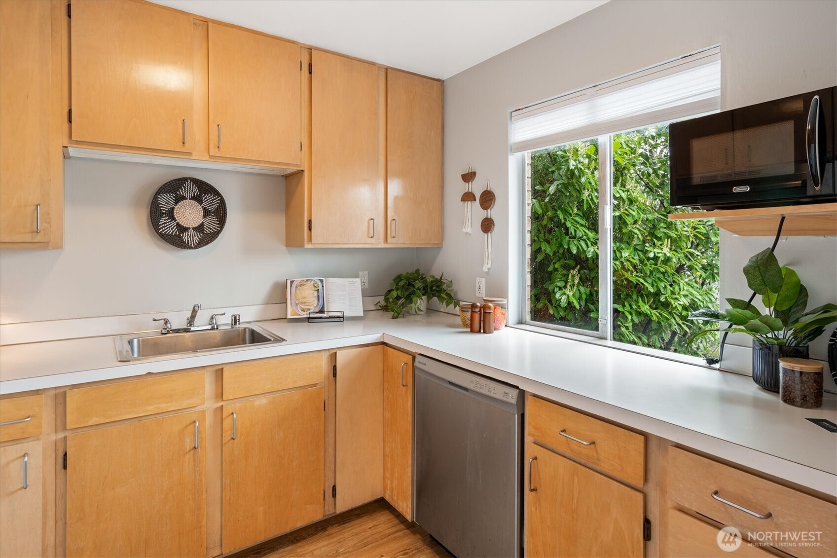 5638 3rd Avenue Northwest Seattle, WA 98107 - Photo 14 of 40 a kitchen with a sink and a cabinets