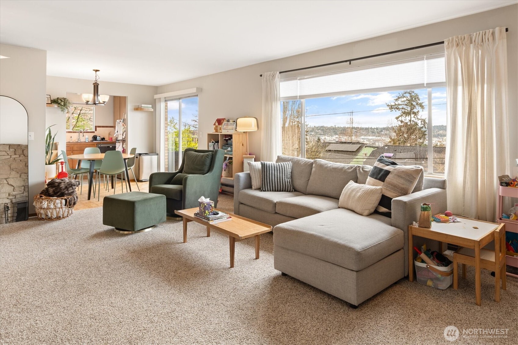 5638 3rd Avenue Northwest Seattle, WA 98107 - Photo 20 of 40 a living room with furniture and a large window