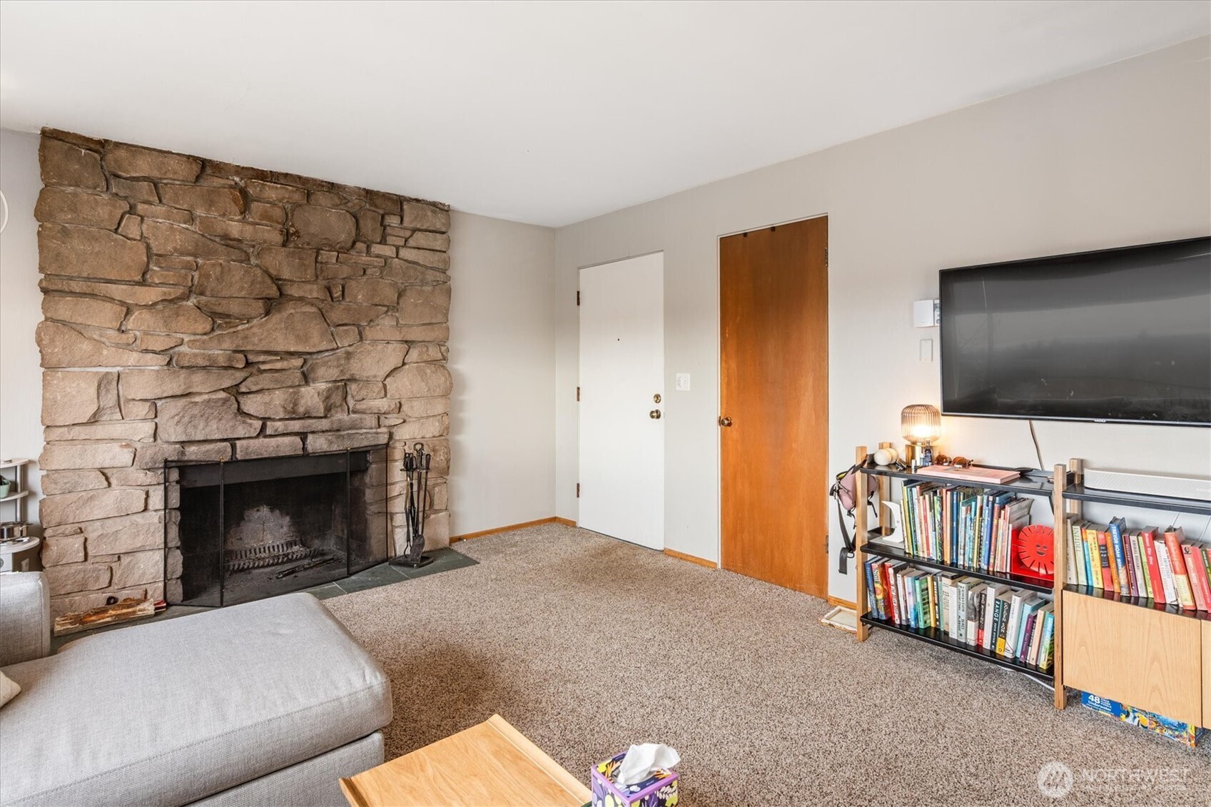 5638 3rd Avenue Northwest Seattle, WA 98107 - Photo 22 of 40 a living room with furniture and a flat screen tv