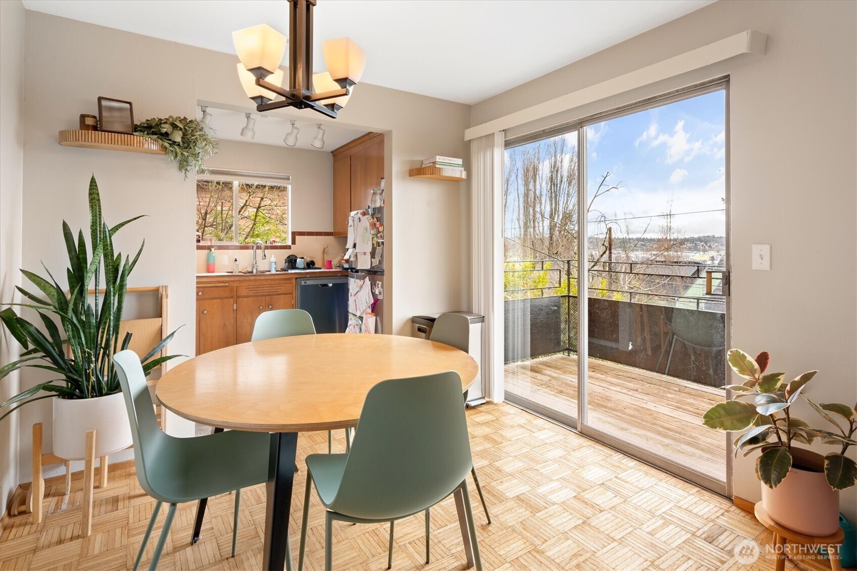5638 3rd Avenue Northwest Seattle, WA 98107 - Photo 23 of 40 a view of a dining room with furniture window and wooden floor