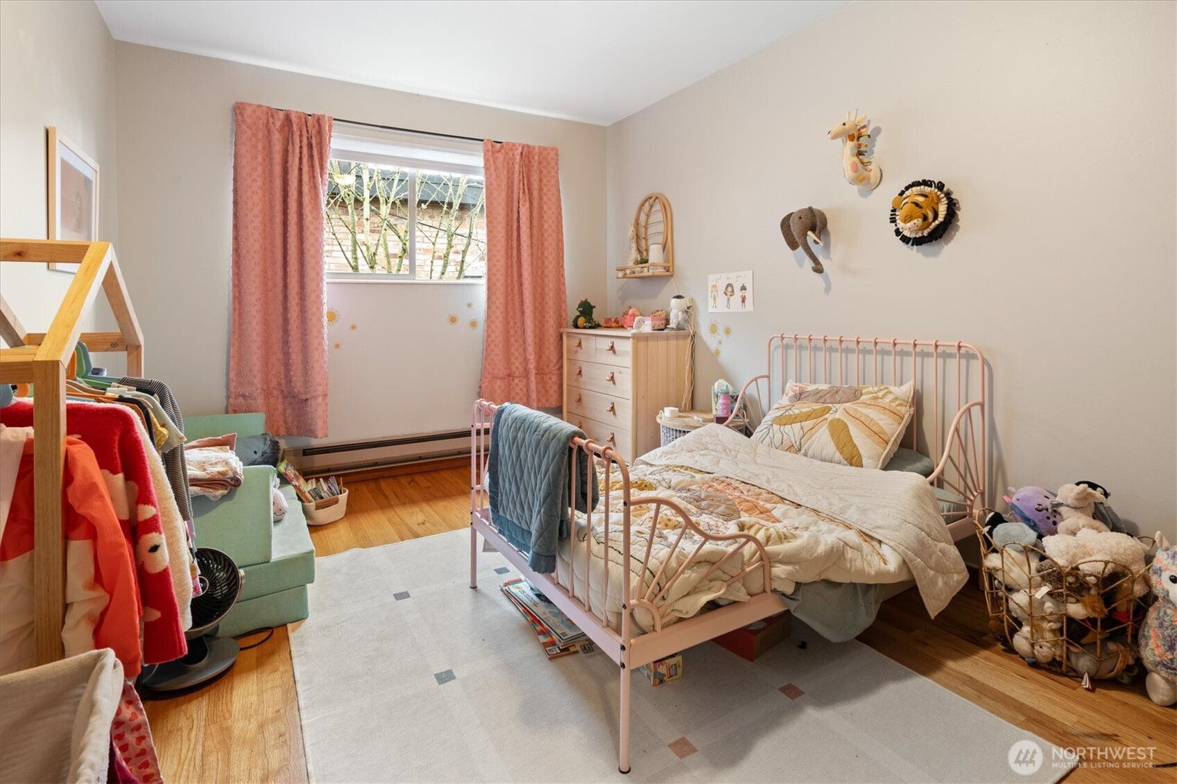 5638 3rd Avenue Northwest Seattle, WA 98107 - Photo 26 of 40 a bedroom with bed and a window