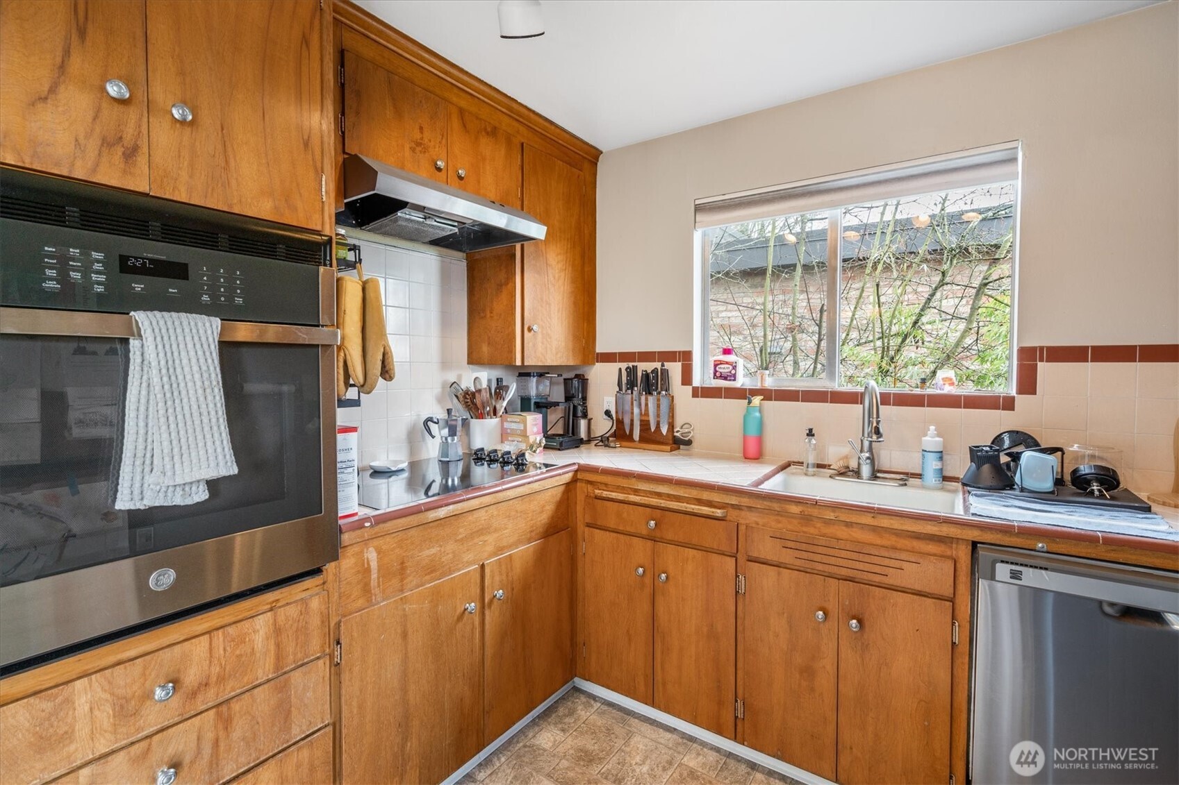 5638 3rd Avenue Northwest Seattle, WA 98107 - Photo 34 of 40 a kitchen with a sink and cabinets