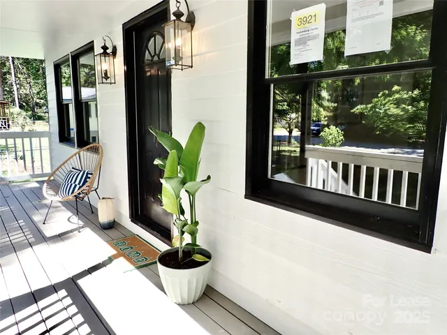 a view of balcony with furniture