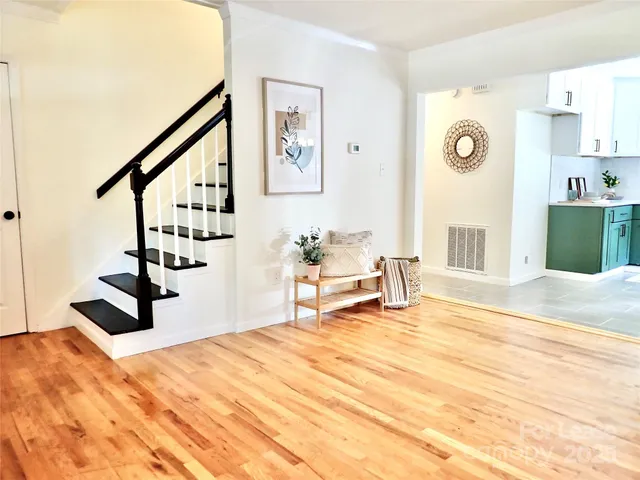 a bedroom with a bed and a table in it