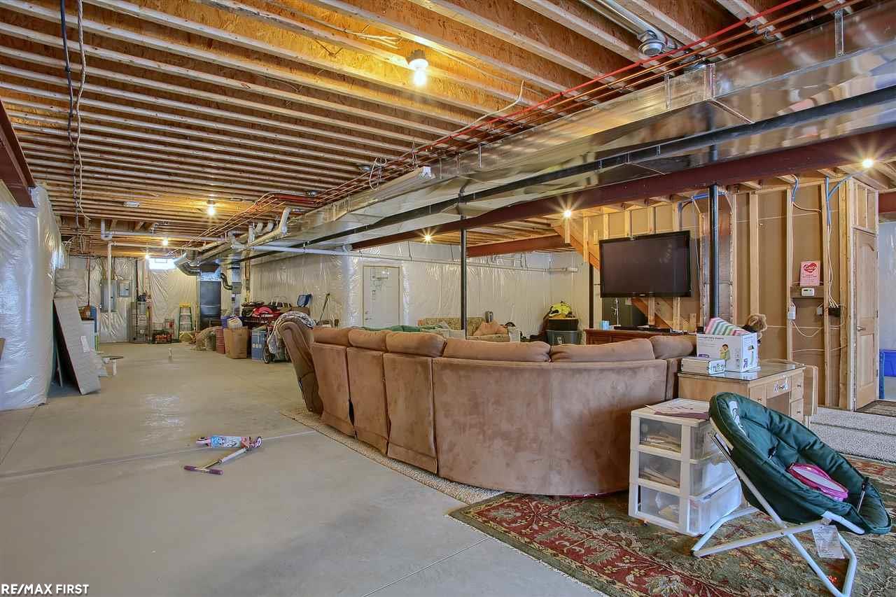 9844 Division Columbus, MI 48063 - Photo 29 of 48 12 ft Ceiling, Separate Entry to Garage, Plumbed for Kitchen and Bathroom, Fully Insulated, Extra Electrical Panel.