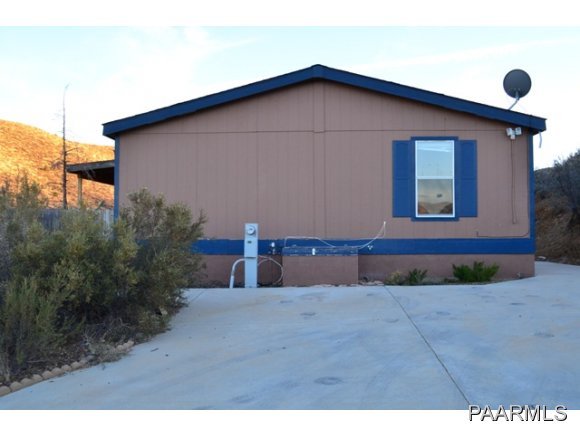 740 North Tubac Road Prescott, AZ 86303 - Photo 1 of 20 a view of a house with a yard