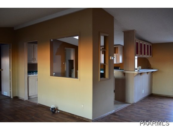 740 North Tubac Road Prescott, AZ 86303 - Photo 11 of 20 a view of kitchen and hall with wooden floor