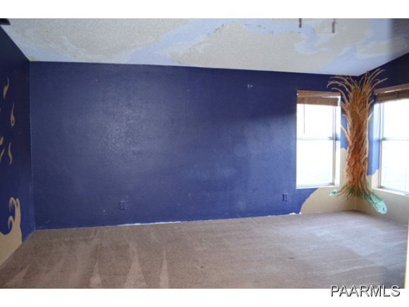740 North Tubac Road Prescott, AZ 86303 - Photo 16 of 20 a view of an empty room and window