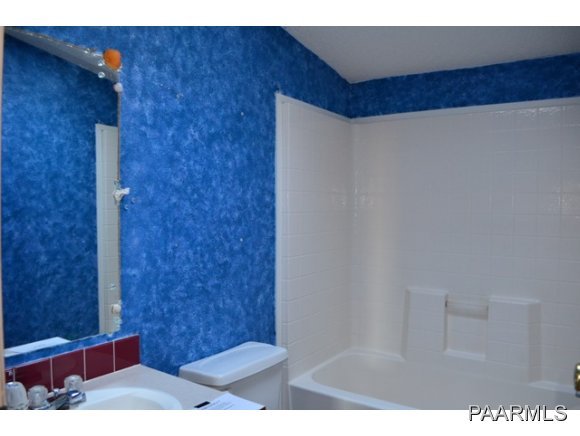 740 North Tubac Road Prescott, AZ 86303 - Photo 10 of 20 a bathroom with a shower and a toilet