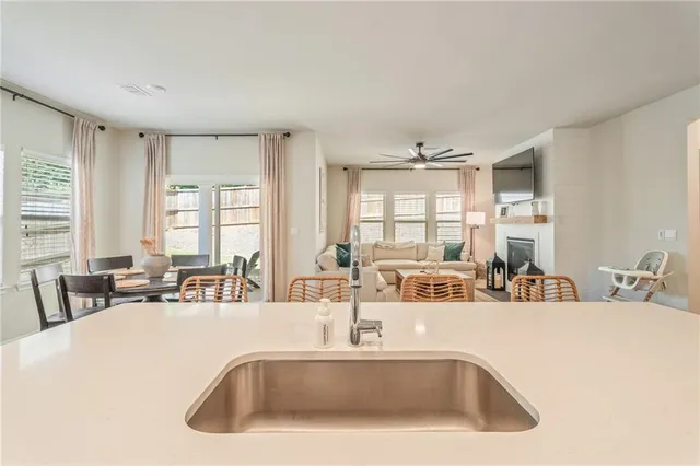 a dining room with furniture and window