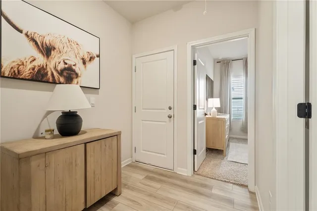 a view of a bedroom from a hallway