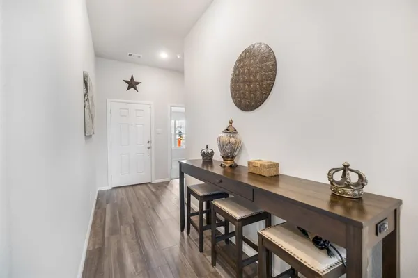 a view of a workspace with furniture