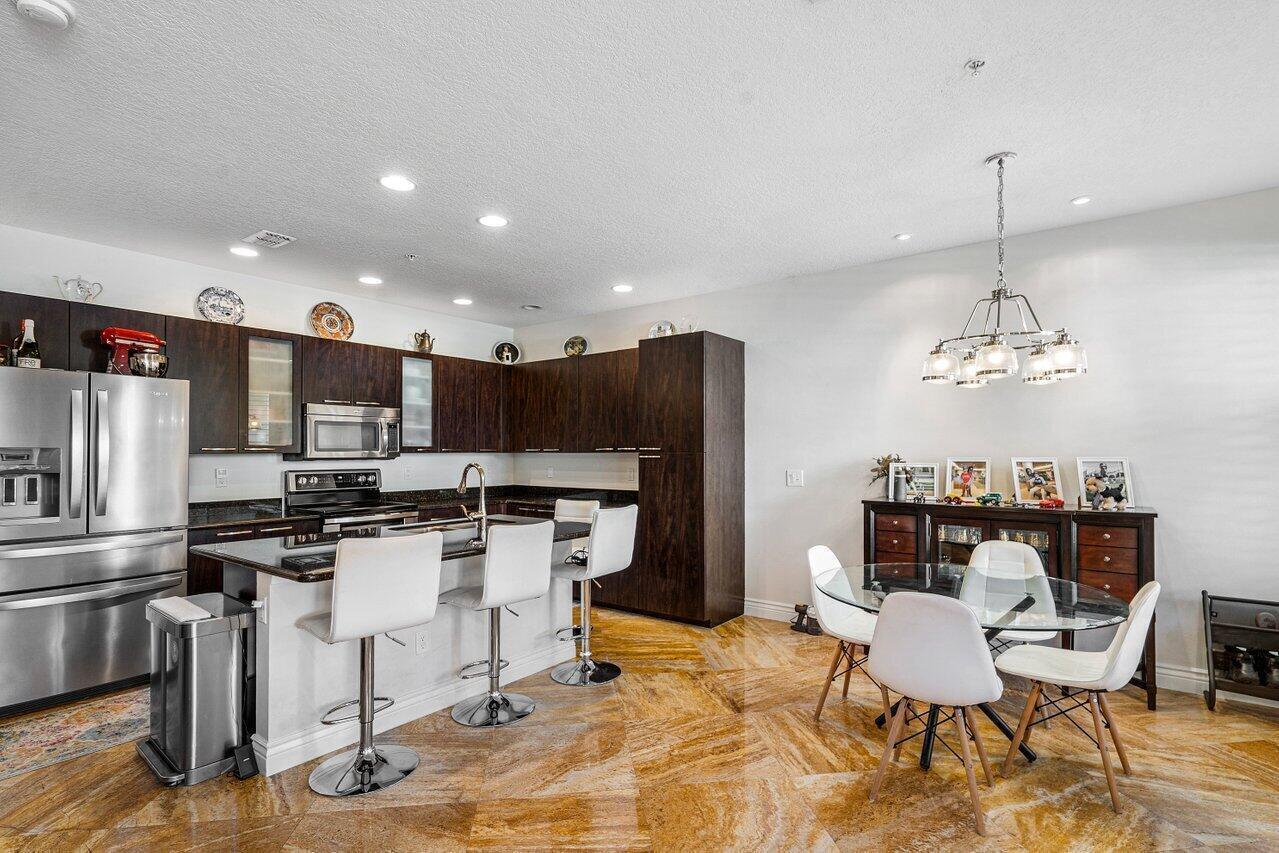 4930 Northwest 15th Avenue Boca Raton, FL 33431 - Photo 3 of 50 KITCHEN AND DINING AREA