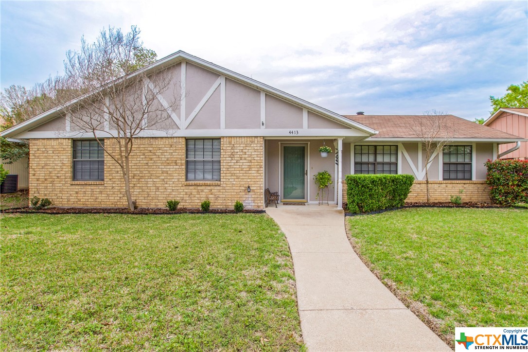 4413 Cactus Trail Temple, TX 76502 - Photo 1 of 1 a front view of a house with garden