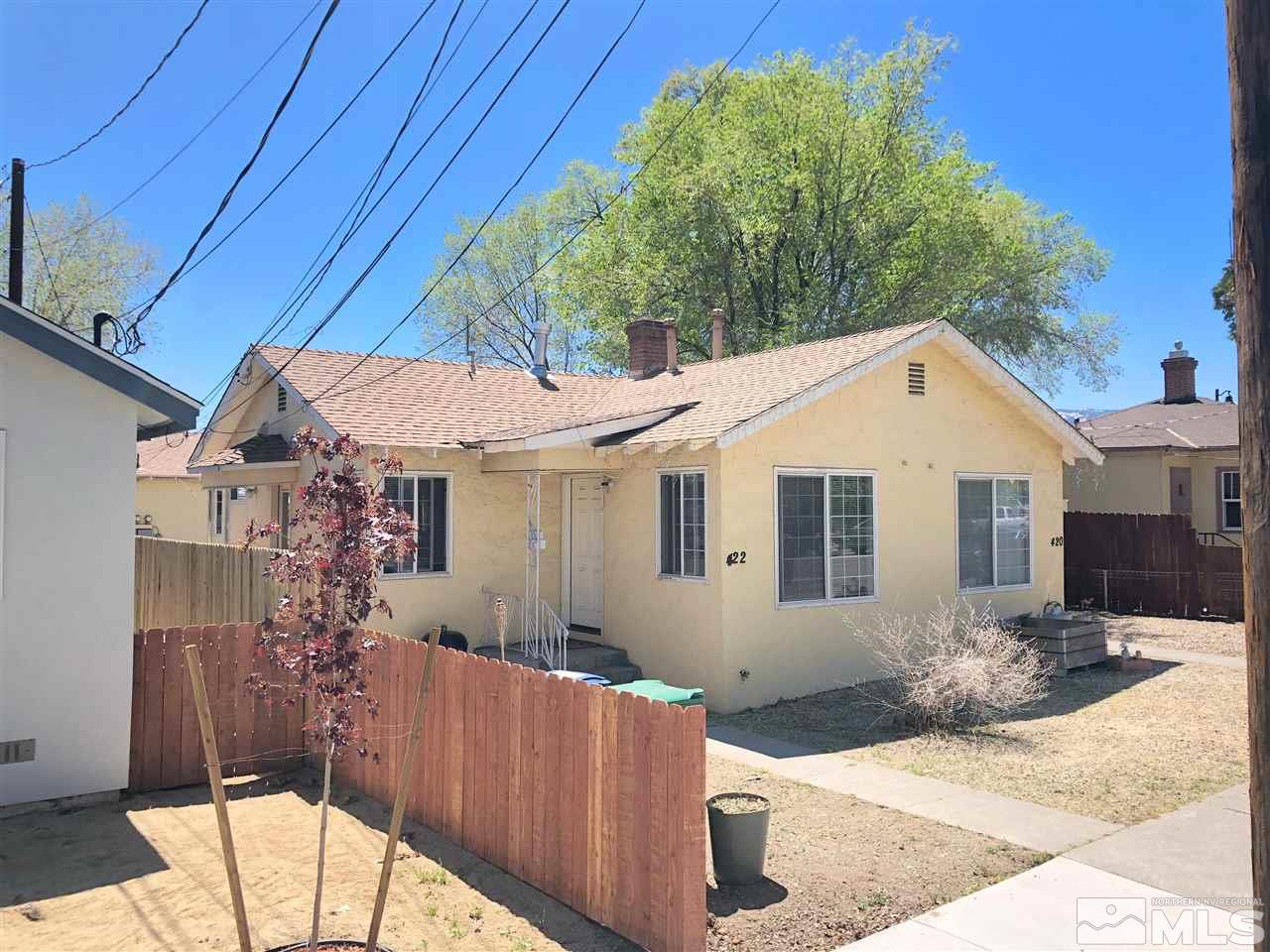 420 Burns Street Reno, NV 89502 - Photo 3 of 17 a front view of a house with a yard