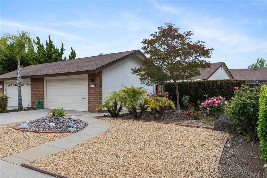 2150 Pepper Tree Place Escondido, CA 92026 - Photo 2 of 48 a front view of a house