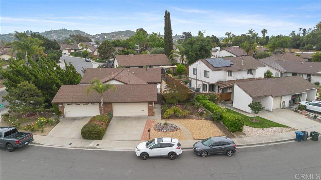 2150 Pepper Tree Place Escondido, CA 92026 - Photo 26 of 48 a car parked in front of a house