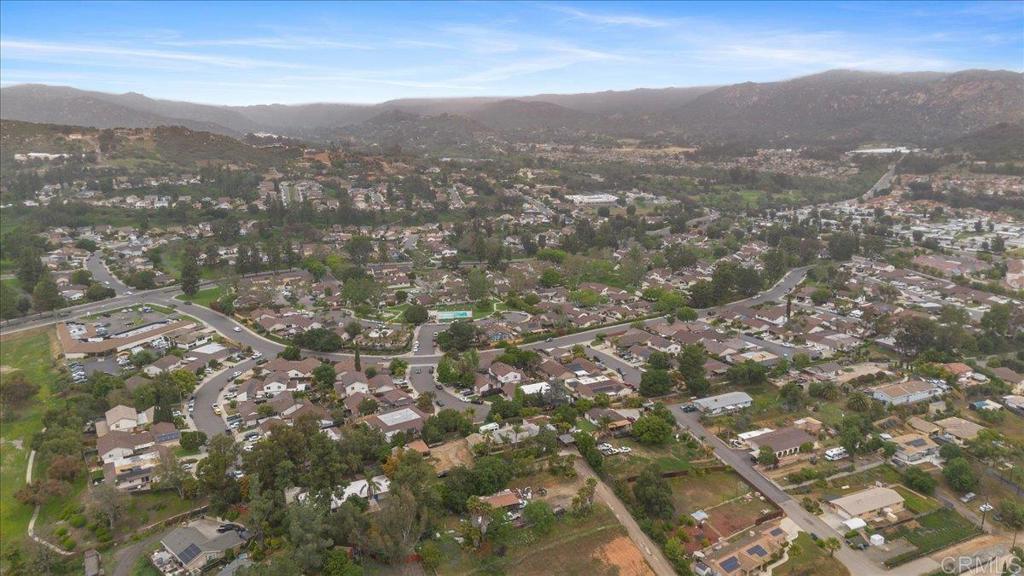 2150 Pepper Tree Place Escondido, CA 92026 - Photo 30 of 48 an aerial view of residential houses with city view and mountain view