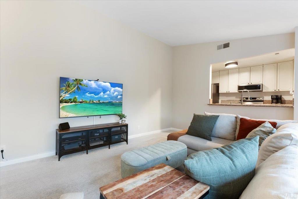 2150 Pepper Tree Place Escondido, CA 92026 - Photo 3 of 48 a living room with furniture and a flat screen tv