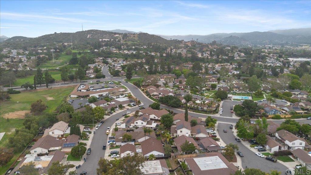 2150 Pepper Tree Place Escondido, CA 92026 - Photo 44 of 48 an aerial view of a city with lots of residential buildings