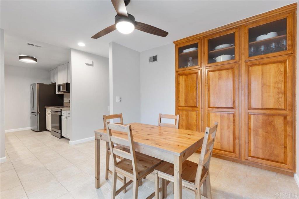 2150 Pepper Tree Place Escondido, CA 92026 - Photo 6 of 48 a view of a dining room with furniture