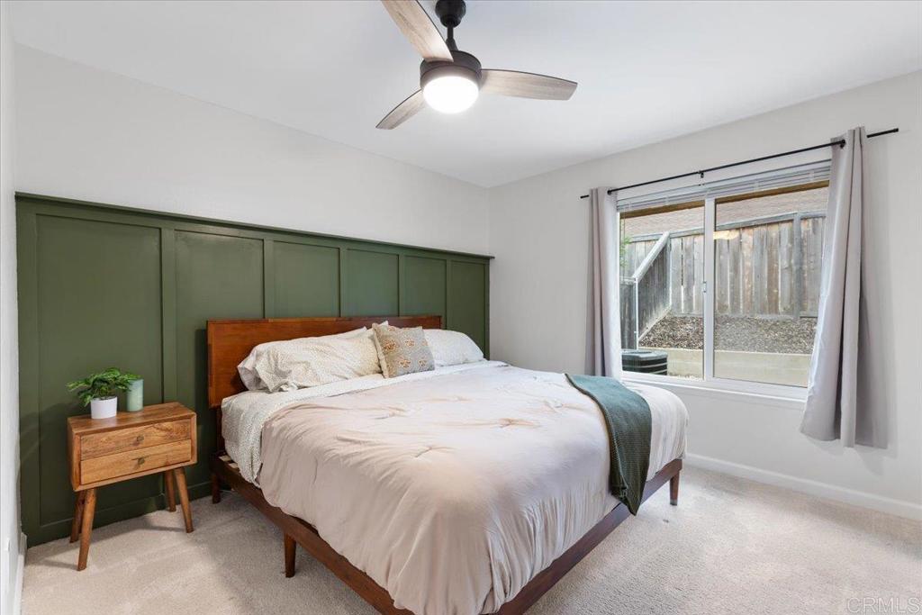 2150 Pepper Tree Place Escondido, CA 92026 - Photo 10 of 48 a bed sitting in a bedroom next to a window