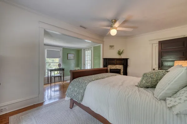 a front view of house with yard and green space