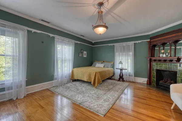 a front view of a house with garden