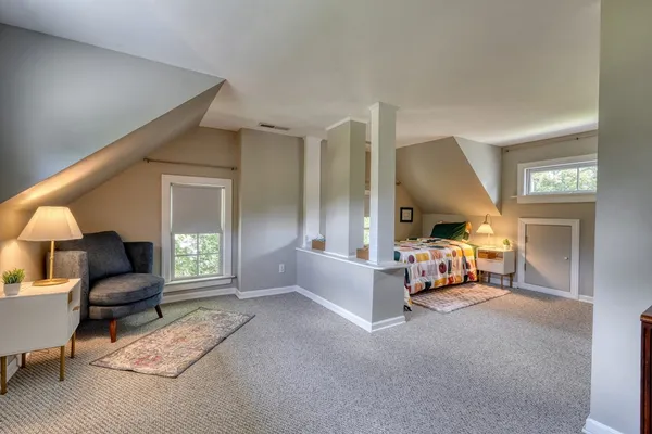 a view of a park with large trees