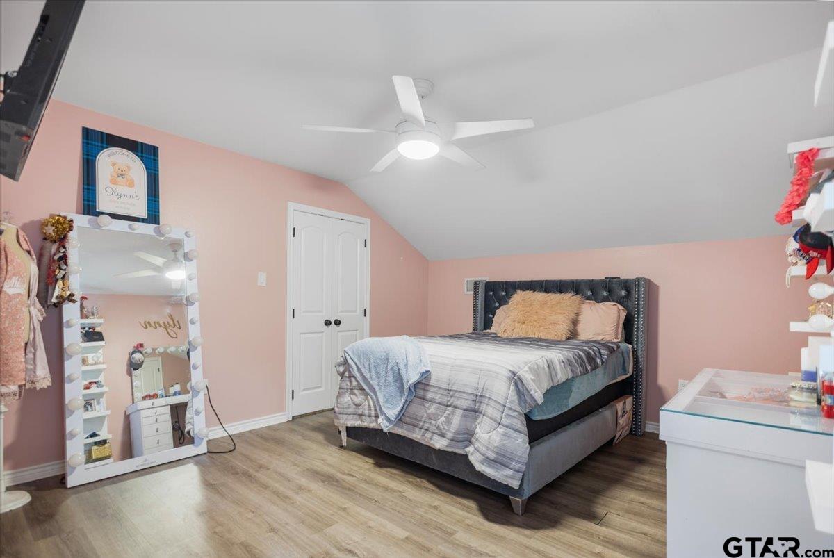 9235 Farm To Market Road 851 Rusk, TX 75785 - Photo 33 of 47 a bedroom with a bed and a window