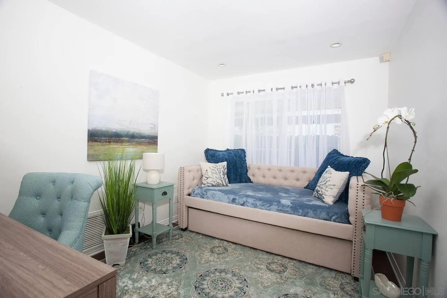 8381 El Paseo Grande La Jolla, CA 92037 - Photo 16 of 21 a living room with furniture and wooden floor