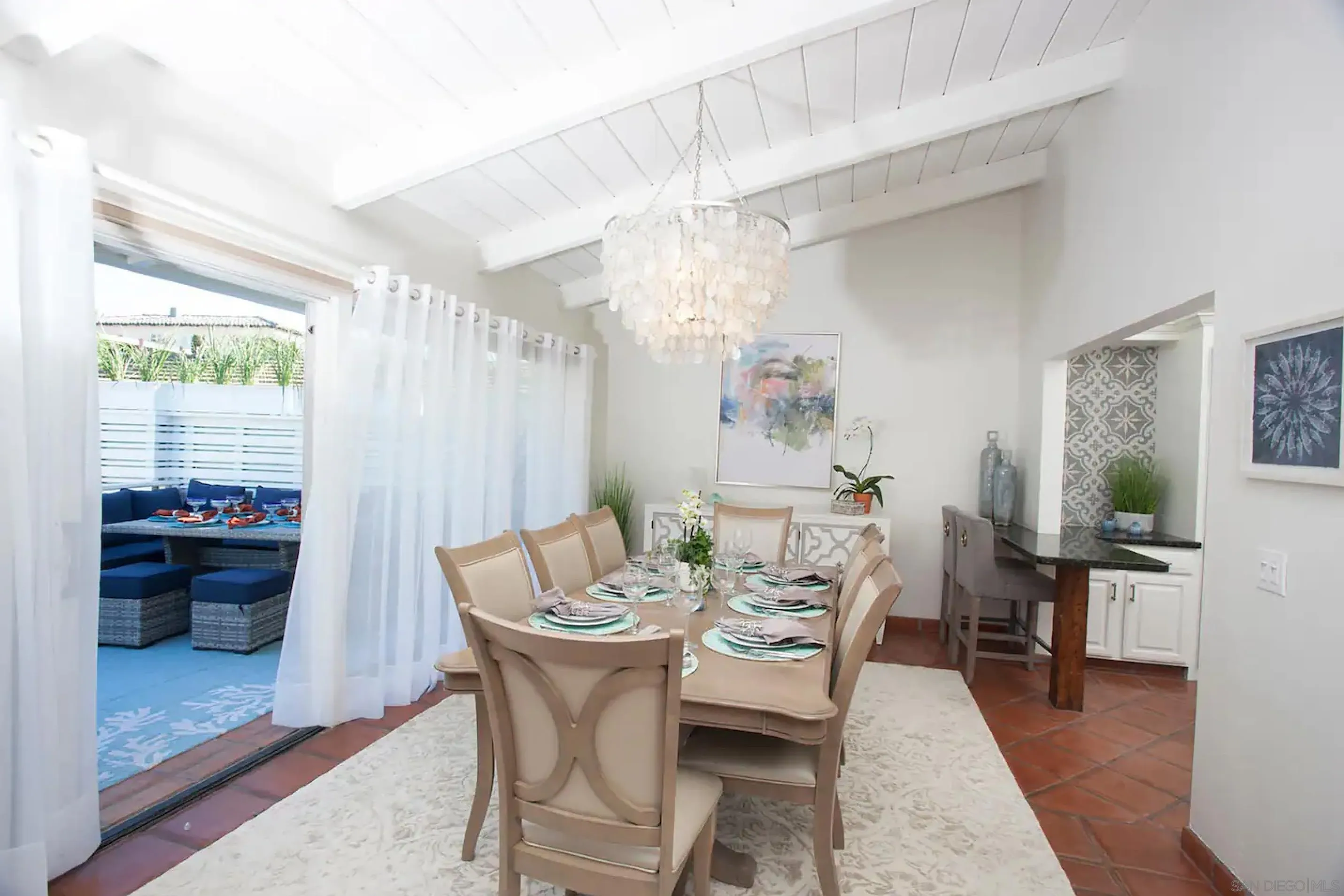 8381 El Paseo Grande La Jolla, CA 92037 - Photo 5 of 21 a dining room with furniture and window