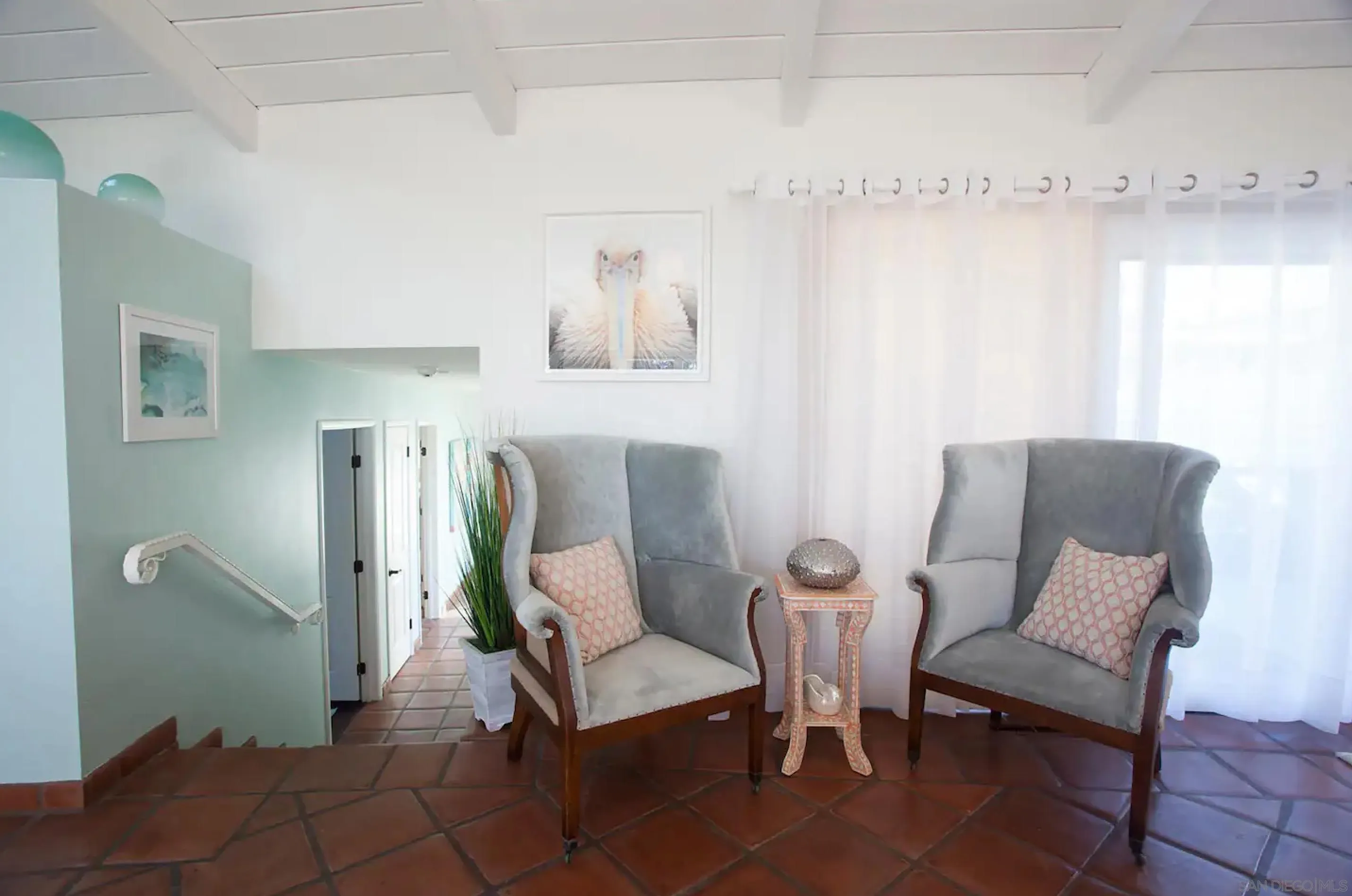 8381 El Paseo Grande La Jolla, CA 92037 - Photo 10 of 21 a living room with furniture and a table